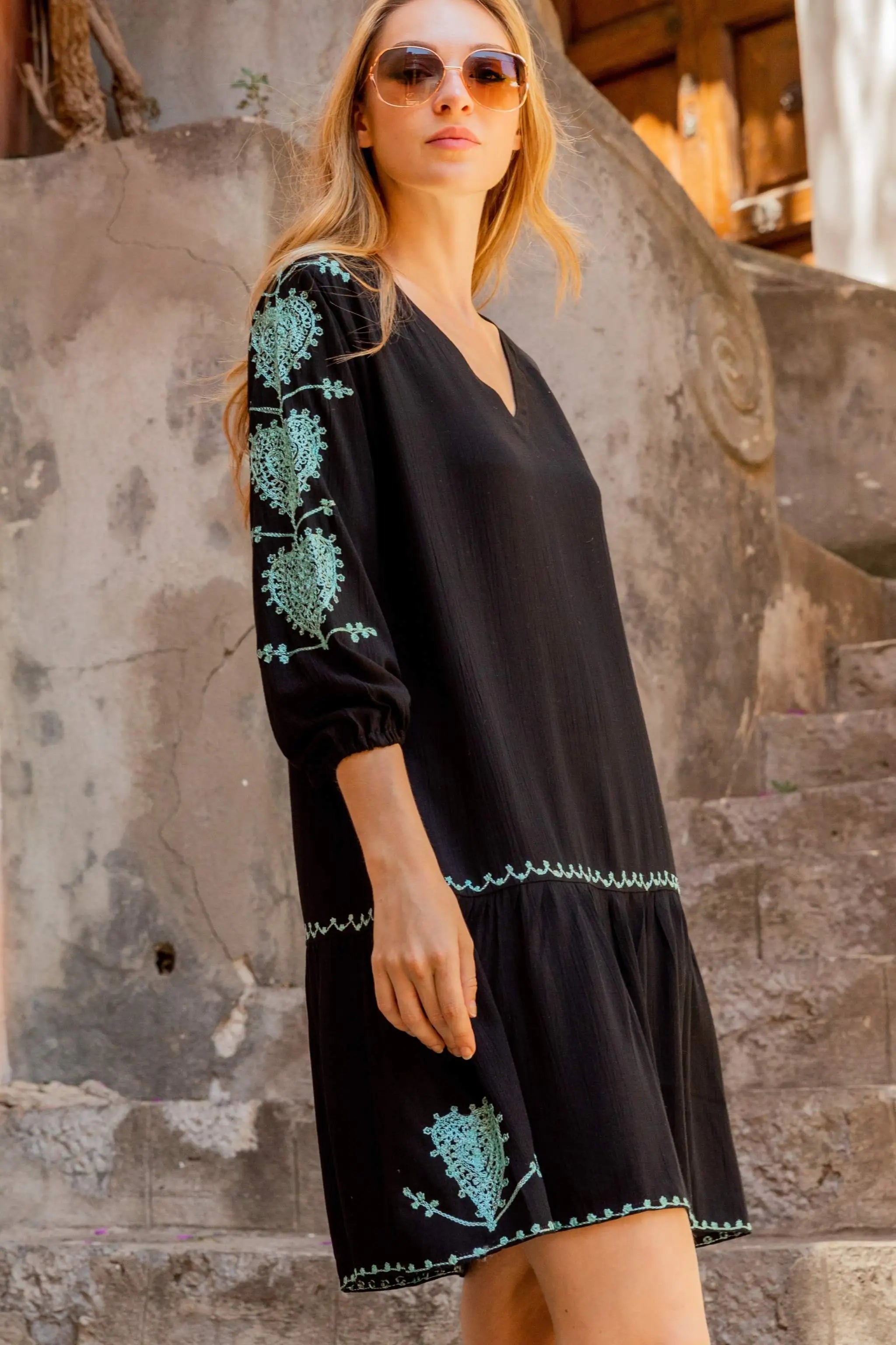 black cotton beach dress with aqua embroidery by Lindsey Brown