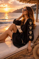 black cotton beach dress long sleeves to wear on cooler beach days by lindsey brown resort wear