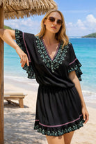 black embroidered beach dresses to wear on a caribbean cruise holiday by lindsey brown resort wear 