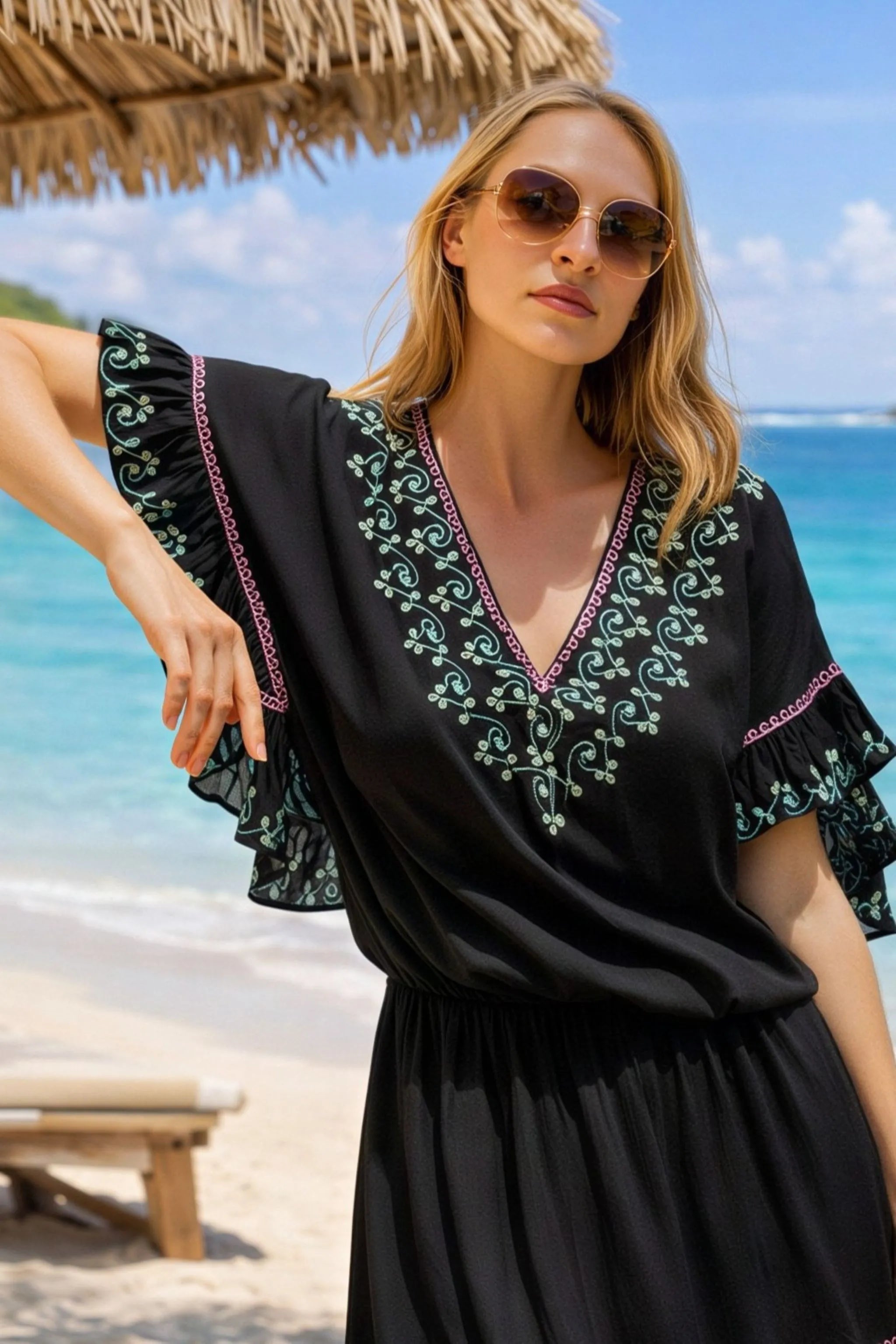 black cotton embroidered beach dresses to wear on a caribbean cruise holiday by lindsey brown resort wear