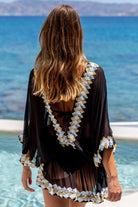 Black sequinned silk kaftans by Lindsey Brown silk resort wear 