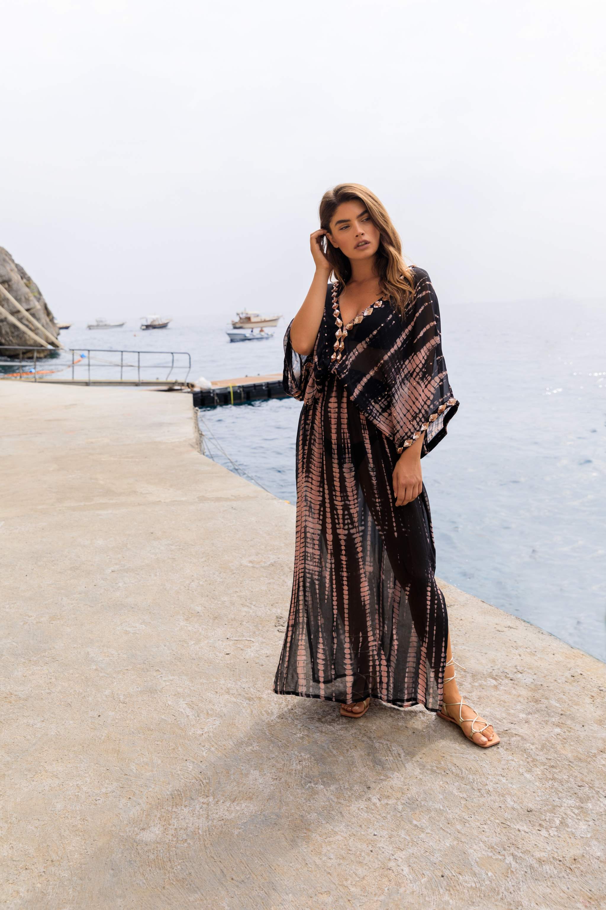 Black stunning silk kaftans to wear over swimwear on luxury holiday by Lindsey Brown