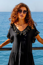 Black cotton loose fitting beach dresses by Lindsey Brown resort wear 