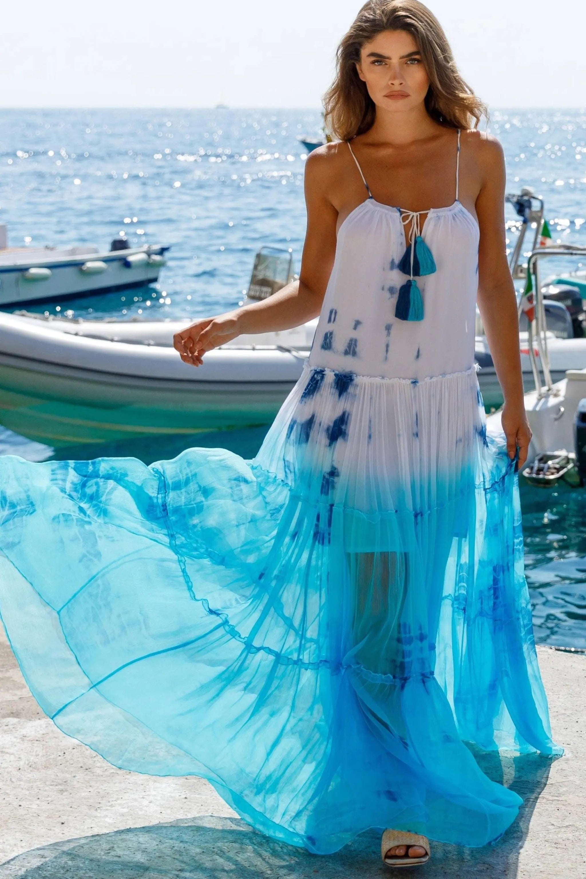 Blue white silk floaty maxi dresses to wear on holiday by Lindsey Brown luxury silk holiday dresses