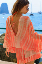 orange short silk kaftan dress to wear on warm holidays 
