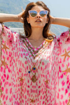 Pink gold animal print silk floaty designer beach coverups by Lindsey Brown resort wear 