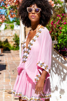 Pink silk kaftans to wear on holiday in a luxury resort by Lindsey Brown