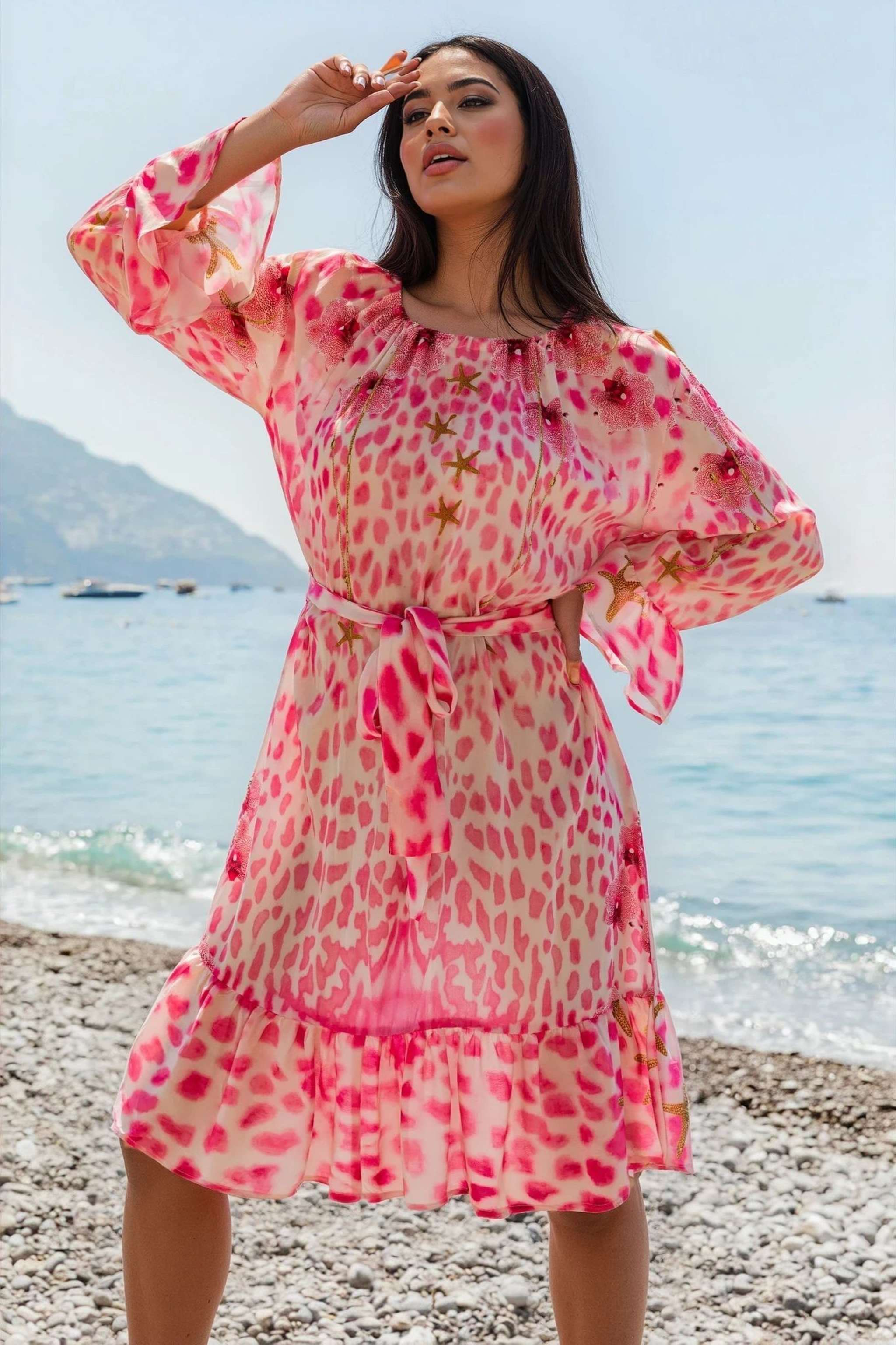 pink animal print long sleeve dress to wear on holiday by Lindsey Brown