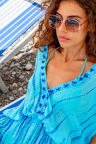 turquoise blue silk tie dye luxury resort wear kaftans by  Lindsey Brown