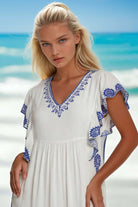 White cotton midi dresses to wear on vacation by Lindsey Brown resort wear 