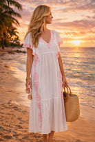 white cotton beach dresses to wear on luxury holidays by lindsey brown