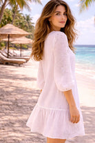 white v neck long sleeved beach dresses to wear on warm holidays 