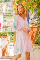 white aqua cotton long sleeved beach dresses by Lindsey Brown 