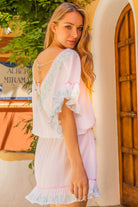 White low back beach dress to wear on a Caribbean Cruise by Lindsey Brown resort wear 