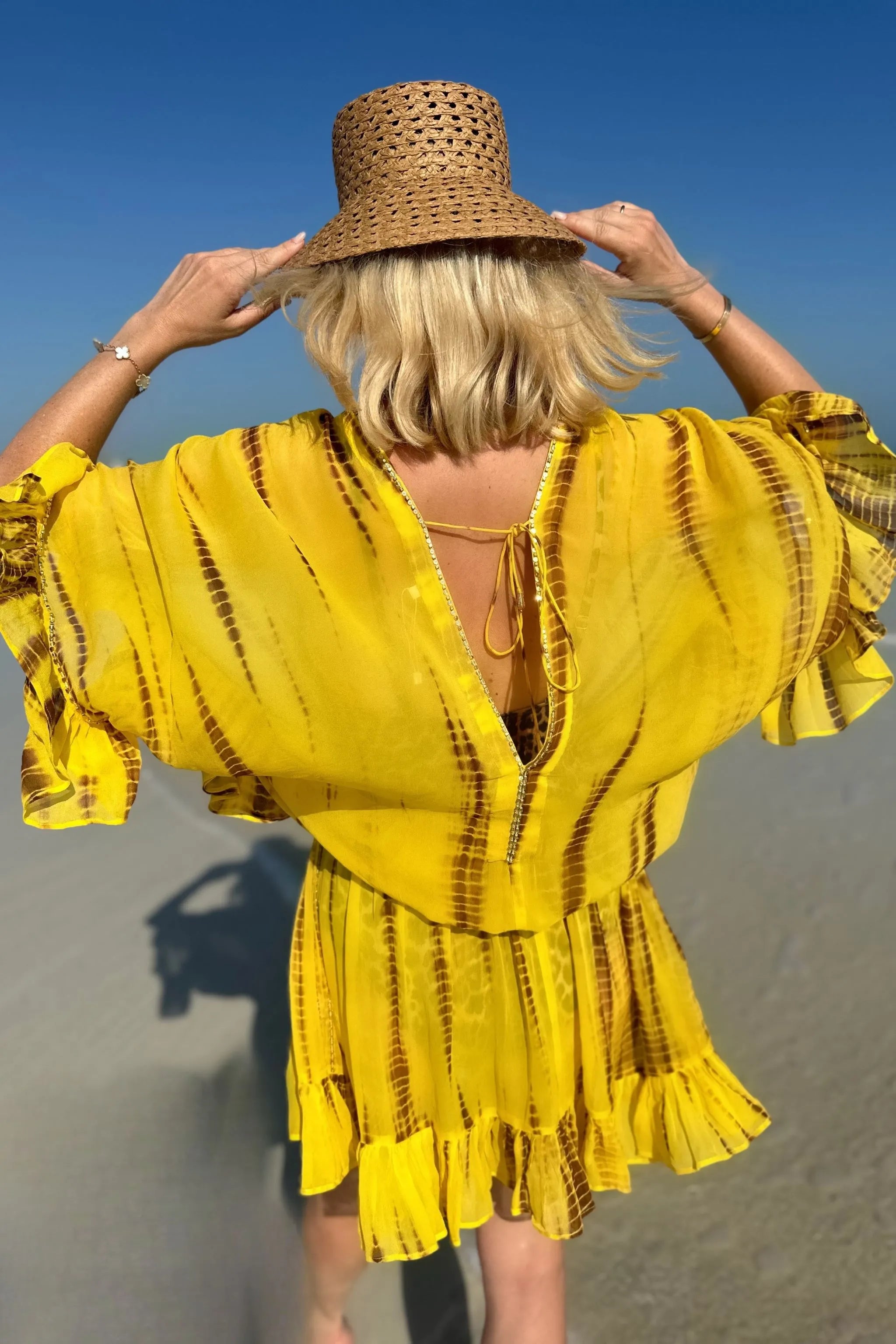 Yellow v back bloused silk kaftan dress to wear on holiday by Lindsey Brown 