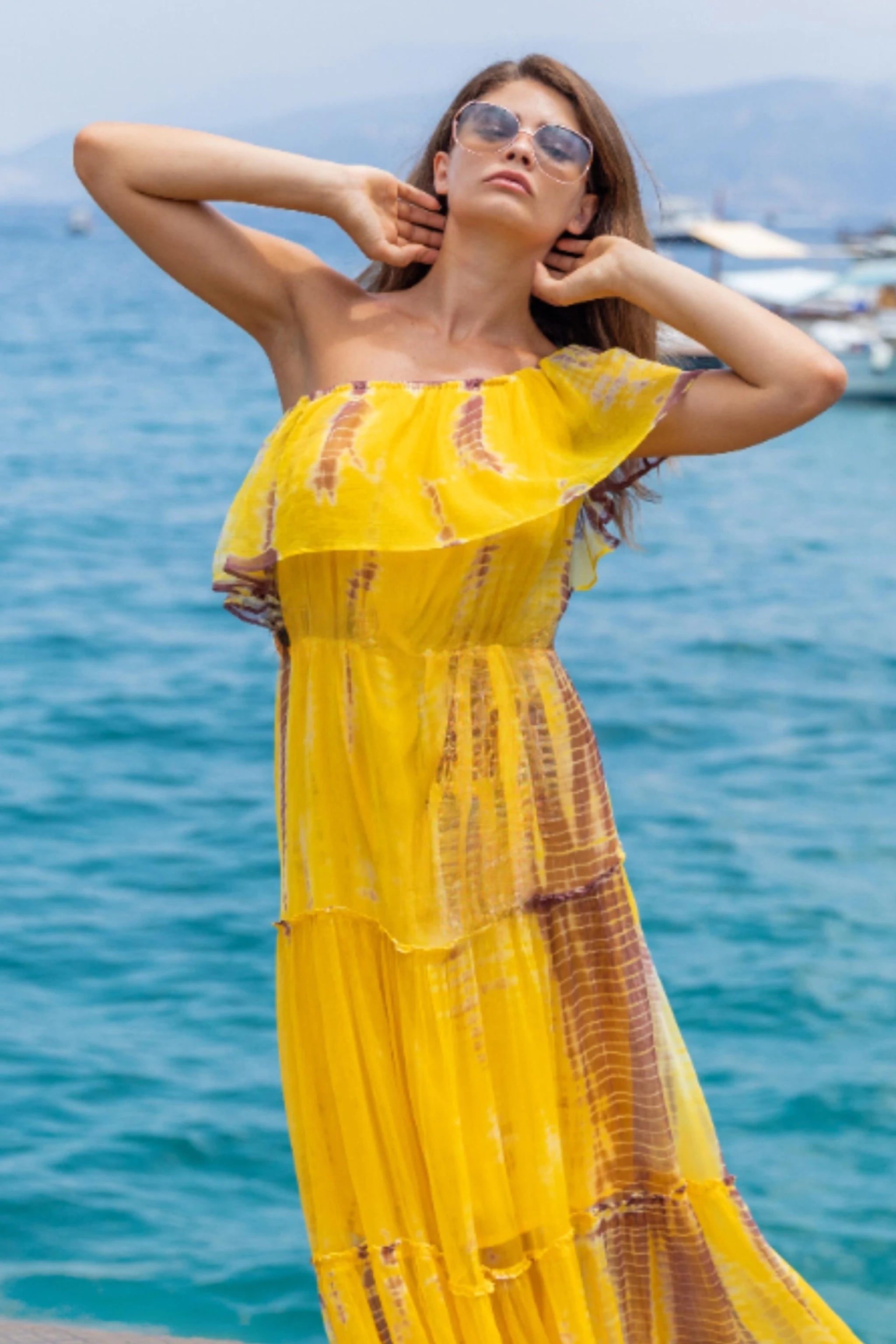 yellow and brown silk tie dye midi dress to wear in the Caribbean by Lindsey Brown