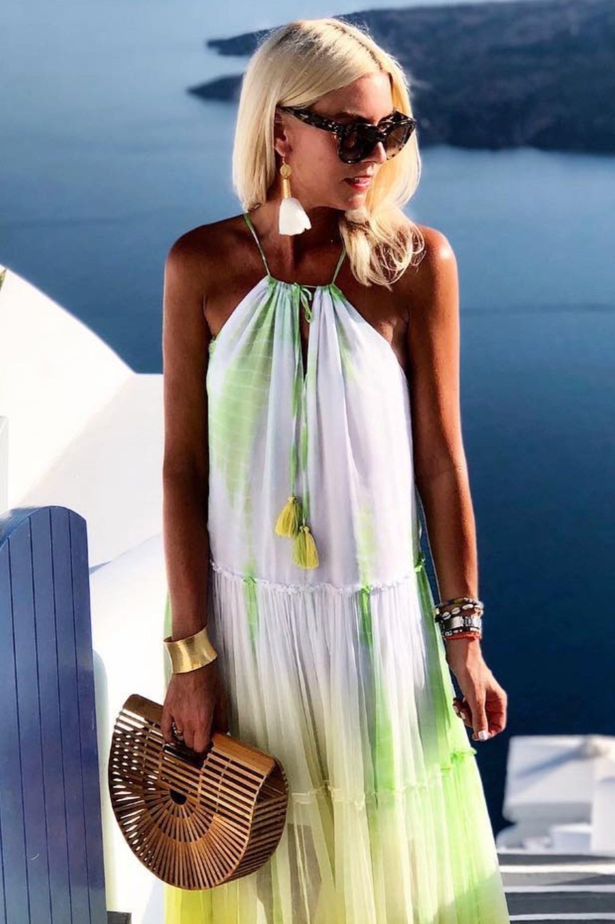 Yellow white silk resort wear dresses to wear in Santorini by Lindsey Brown